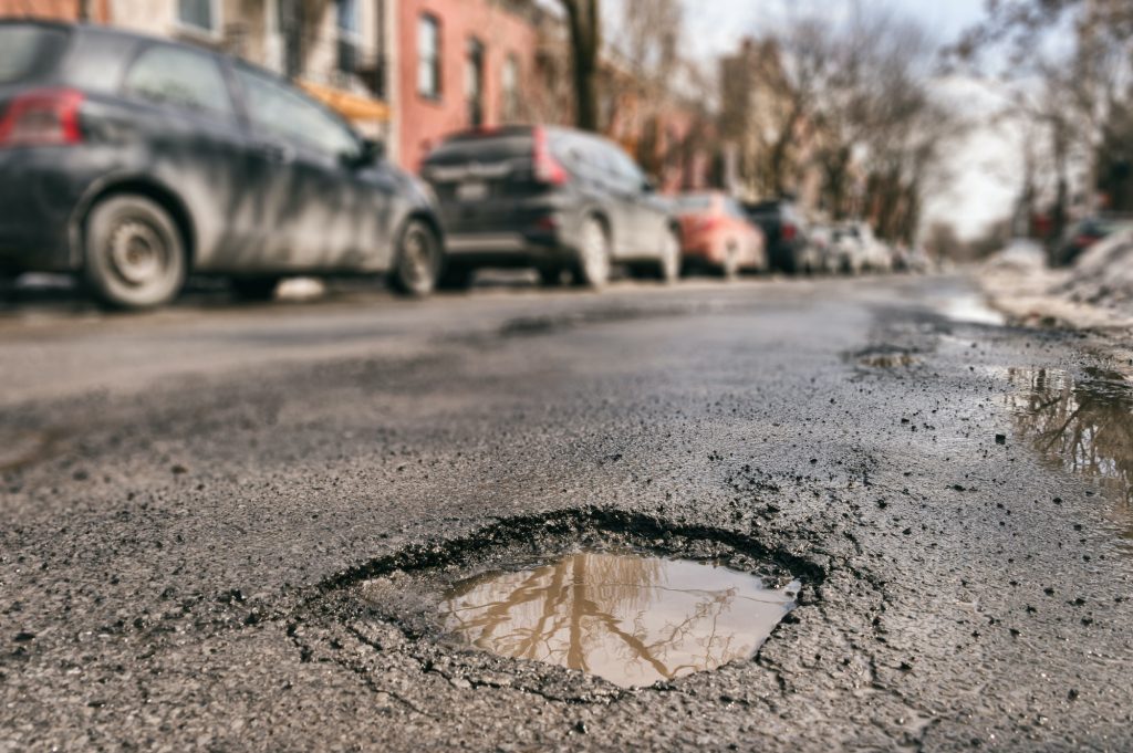 How Potholes In Your Parking Lot Impact Your Business